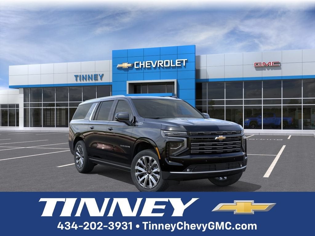 2026 Chevrolet Suburban High Country in Black — front three-quarter view