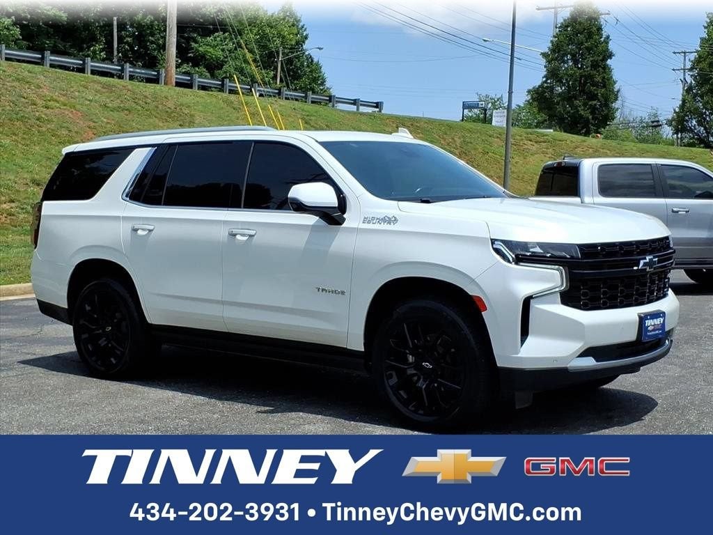 2023 Chevrolet Tahoe High Country in Iridescent Pearl Tricoat — front three-quarter view