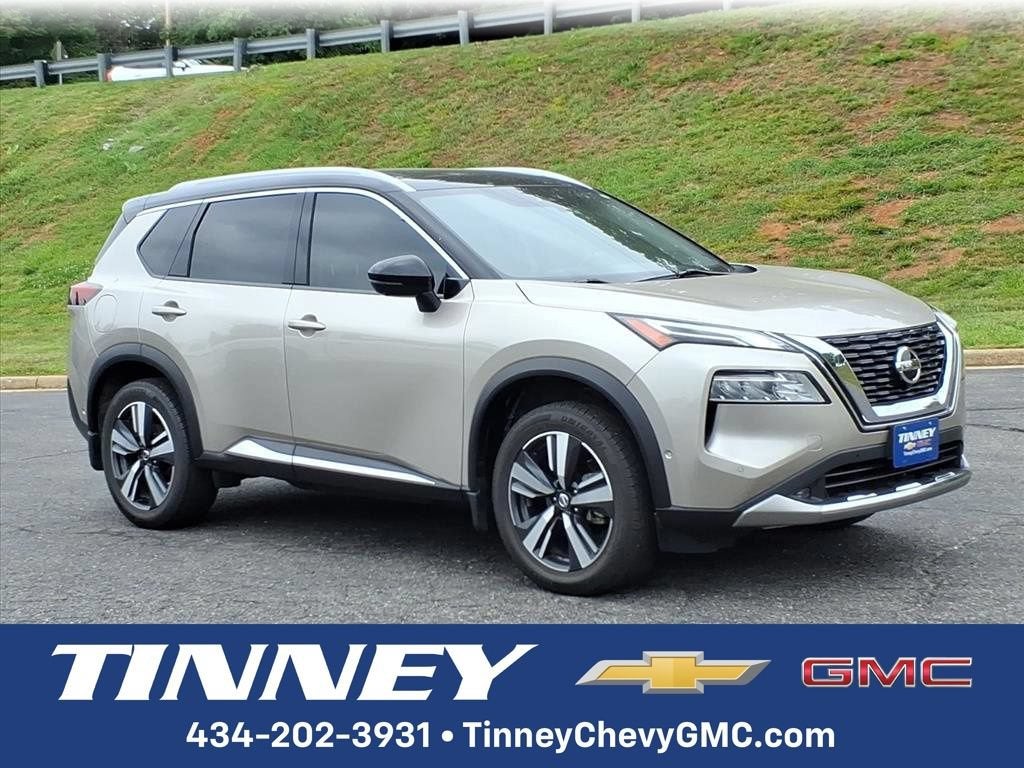 2021 Nissan Rogue Platinum in Tan — front three-quarter view